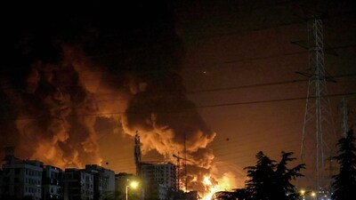 A fire blazes in the oil depots of Shahran, northwest of Tehran, on June 15, 2025. Israel and Iran exchanged fire on June 14, a day after Israel unleashed an unprecedented aerial bombing campaign that Iran said hit its nuclear facilities, 'martyred' top commanders and killed dozens of civilians. (Atta Kenare/AFP) A fire blazes in the oil depots of Shahran, northwest of Tehran, on June 15, 2025. Israel and Iran exchanged fire on June 14, a day after Israel unleashed an unprecedented aerial bombing campaign that Iran said hit its nuclear facilities, 'martyred' top commanders and killed dozens of civilians. (Atta Kenare/AFP)