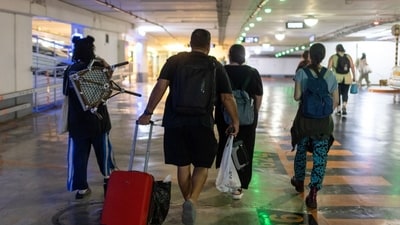 Residents take shelter during an Iranian ballistic missile attack in Tel Aviv, Israel. (Kobi Wolf/Bloomberg) Residents take shelter during an Iranian ballistic missile attack in Tel Aviv, Israel. (Kobi Wolf/Bloomberg)