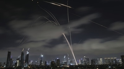 Israeli Iron Dome air defense system fires to intercept missiles over Tel Aviv, Israel, early Sunday, June 15, 2025. (AP Photo/Leo Correa) Israeli Iron Dome air defense system fires to intercept missiles over Tel Aviv, Israel, early Sunday, June 15, 2025. (AP Photo/Leo Correa)