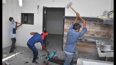 MC workers demolishing the house of a drug peddling accused under heavy police presence in Amarpura Mohalla, Ludhiana, on Sunday. (Manish/HT) MC workers demolishing the house of a drug peddling accused under heavy police presence in Amarpura Mohalla, Ludhiana, on Sunday. (Manish/HT)