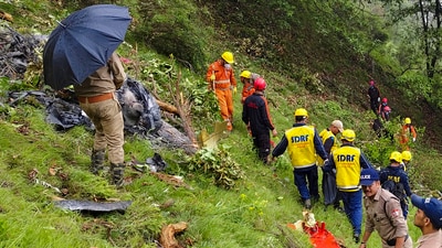 NDRF and SDRF personnel at the spot after a helicopter crashed near the Kedarnath shrine, in Rudraprayag district, Uttarakhand, Sunday, June 15, 2025. (PTI)
