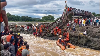 Rescue operation underway after an iron bridge over the Indrayani river collapsed, in Pune district, Maharashtra. (NDRF) Rescue operation underway after an iron bridge over the Indrayani river collapsed, in Pune district, Maharashtra. (NDRF)