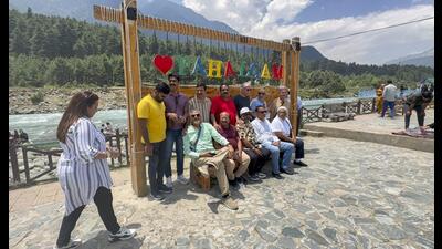 Tourists enjoying in Pahalgam, Anantnag, on Sunday. (PTI) Tourists enjoying in Pahalgam, Anantnag, on Sunday. (PTI)