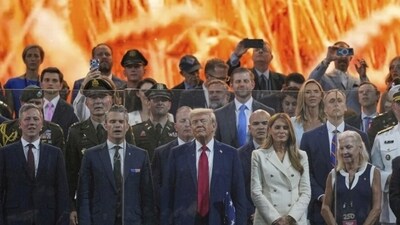 Trump saluted as soldiers marched past the reviewing stand. However, the number of attendees seemed to be significantly less than the initial estimates of up to 200,000 people for the parade and festival. (AP) Trump saluted as soldiers marched past the reviewing stand. However, the number of attendees seemed to be significantly less than the initial estimates of up to 200,000 people for the parade and festival. (AP)