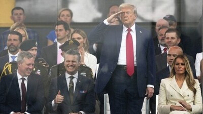 President Donald Trump salutes as attends a military parade commemorating the Army’s 250th anniversary, coinciding with his 79th birthday, Saturday, June 14, 2025, in Washington, as Secretary of the Army Daniel Driscoll, Defense Secretary Pete Hegseth, and first lady Melania Trump, watch. (AP Photo/Julia Demaree Nikhinson) President Donald Trump salutes as attends a military parade commemorating the Army’s 250th anniversary, coinciding with his 79th birthday, Saturday, June 14, 2025, in Washington, as Secretary of the Army Daniel Driscoll, Defense Secretary Pete Hegseth, and first lady Melania Trump, watch. (AP Photo/Julia Demaree Nikhinson)