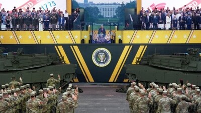 Across the nation, the Marines that Trump sent to Los Angeles made their first appearance at a 'No Kings Day' protest, standing guard outside a federal facility while armored vehicles passed down the street. (AP) Across the nation, the Marines that Trump sent to Los Angeles made their first appearance at a 'No Kings Day' protest, standing guard outside a federal facility while armored vehicles passed down the street. (AP)