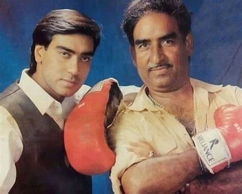 Ajay Devgn with his father and stunt director Veeru Devgan. Ajay Devgn with his father and stunt director Veeru Devgan.