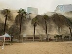Dust billows out of a landslide during the earthquake in Lima. Dust billows out of a landslide during the earthquake in Lima.