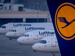 Lufthansa aircrafts are parked at the airport in Frankfurt, Germany. Lufthansa aircrafts are parked at the airport in Frankfurt, Germany.
