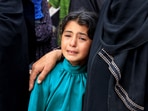 A mourner reacts during the funeral of Palestinians killed in what the Gaza health ministry says was Israeli fire near a distribution center in Rafah, at Nasser Hospital in Khan Younis, in the southern Gaza Strip, June 16, 2025.