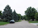 Law enforcement establish a security perimeter near the residence of senior Democratic state assemblywoman Melissa Hortman after Hortman and her husband, Mark, were shot and killed earlier in the day, in Brooklyn Park, Minnesota, U.S., June 14, 2025. 