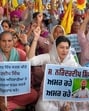 Relatives of Narinderdeep Singh staging a protest on Ferozepur Road in Ludhiana on Monday. (HT Photo)