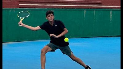 A player in action during the AITA Championship Series Tennis Tournament held at the Chandigarh Lawn Tennis Association Stadium. (HT photo)