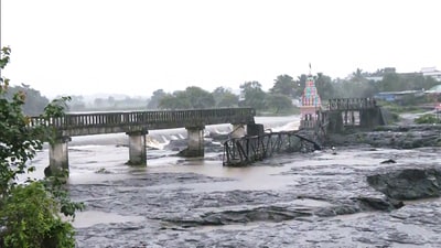 A view of the bridge that collapsed on the Indrayani River, near Kundamala village. (ANI Grab ) A view of the bridge that collapsed on the Indrayani River, near Kundamala village. (ANI Grab )