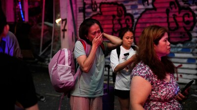 People evacuate after a missile launched from Iran struck Tel Aviv, Israel, Monday June 16, 2025 (AP) People evacuate after a missile launched from Iran struck Tel Aviv, Israel, Monday June 16, 2025 (AP)
