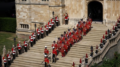 Yeomen Warders and members of the household cavalry wait outside the chapel during the Order of the Garter service at St George's Chapel in Windsor Castle, southern England, on June 16, 2025.   HENRY NICHOLLS/Pool via REUTERS (via REUTERS)