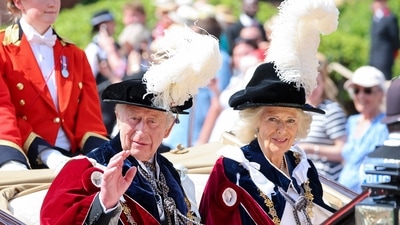 Britain's King Charles III and Britain's Queen Camilla travel in a horse-drawn carriage as they leave after the Order of the Garter service at St George's Chapel in Windsor Castle, southern England, on June 16, 2025. (AFP) Britain's King Charles III and Britain's Queen Camilla travel in a horse-drawn carriage as they leave after the Order of the Garter service at St George's Chapel in Windsor Castle, southern England, on June 16, 2025. (AFP)