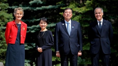 KANANASKIS, ALBERTA - JUNE 16: Japanese Prime Minister Shigeru Ishiba (center right) and his wife Yoshiko Ishiba (center left) pose for a photo with Canadian Prime Minister Mark Carney and his wife Diana Fox Carney at the official welcome ceremony during the G7 Leaders' Summit on June 16, 2025 in Kananaskis, Alberta. Canada is hosting this year's meeting of the world's seven largest economies. Chip Somodevilla/Getty Images/AFP (Photo by CHIP SOMODEVILLA / GETTY IMAGES NORTH AMERICA / Getty Images via AFP) (Getty Images via AFP) KANANASKIS, ALBERTA - JUNE 16: Japanese Prime Minister Shigeru Ishiba (center right) and his wife Yoshiko Ishiba (center left) pose for a photo with Canadian Prime Minister Mark Carney and his wife Diana Fox Carney at the official welcome ceremony during the G7 Leaders' Summit on June 16, 2025 in Kananaskis, Alberta. Canada is hosting this year's meeting of the world's seven largest economies. Chip Somodevilla/Getty Images/AFP (Photo by CHIP SOMODEVILLA / GETTY IMAGES NORTH AMERICA / Getty Images via AFP) (Getty Images via AFP)