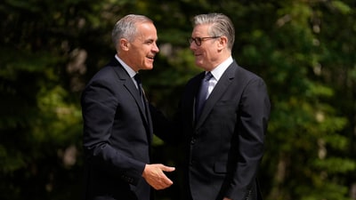 Canada's Prime Minister Mark Carney, left, greets Britain's Prime Minister Keir Starmer during the official welcome of the G7 Summit, Monday, June 16, 2025, in Kananaskis, Canada. (AP Photo/Mark Schiefelbein) (AP) Canada's Prime Minister Mark Carney, left, greets Britain's Prime Minister Keir Starmer during the official welcome of the G7 Summit, Monday, June 16, 2025, in Kananaskis, Canada. (AP Photo/Mark Schiefelbein) (AP)