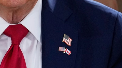 President Donald Trump wears a pin with the flags of Canada and the United States as he participates in a session of the G7 Summit, Monday, June 16, 2025, He said kicking Russia out of the former Group of Eight was a mistake. Members removed Russia in 2014 after it annexed Crimea. (AP) President Donald Trump wears a pin with the flags of Canada and the United States as he participates in a session of the G7 Summit, Monday, June 16, 2025, He said kicking Russia out of the former Group of Eight was a mistake. Members removed Russia in 2014 after it annexed Crimea. (AP)