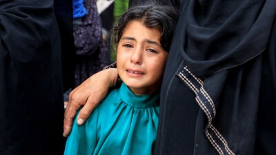 A mourner reacts during the funeral of Palestinians killed in what the Gaza health ministry says was Israeli fire near a distribution center in Rafah, at Nasser Hospital in Khan Younis, in the southern Gaza Strip, June 16, 2025. (Reuters/Hatem Khaled)
