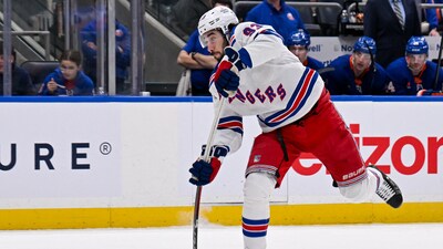 New York Rangers center Mika Zibanejad (93) attempts a shot against the New York Islanders. (IMAGN IMAGES via Reuters Connect)