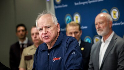 Minnesota Gov. Tim Walz speaks during a press conference at the State Emergency Operations Center (AP) Minnesota Gov. Tim Walz speaks during a press conference at the State Emergency Operations Center (AP)