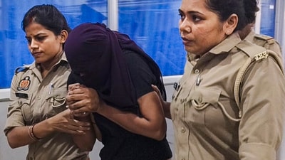 Sonam Raghuvanshi, the Indore woman accused of plotting her husband's murder during their honeymoon in Meghalaya, being brought for medical examination at a hospital, in Ghazipur earlier this month. (PTI)