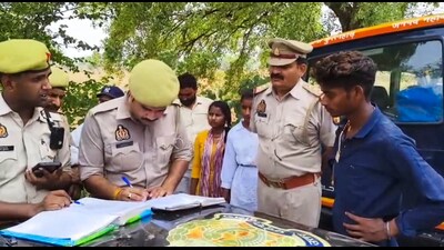 Police investigate a car-bike collision, which left five dead and at least two critical, in Mahoba on Monday, (PTI)