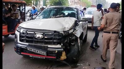 The Hyundai Creta car that collided with an e-rickshaw on Udyog Vihar Road near Shankar Chowk in Gurugram. (HT PHOTO) The Hyundai Creta car that collided with an e-rickshaw on Udyog Vihar Road near Shankar Chowk in Gurugram. (HT PHOTO)