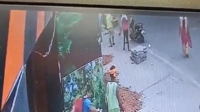 The new CCTV footage shows woman attacking the biker first in Bengaluru. The new CCTV footage shows woman attacking the biker first in Bengaluru.