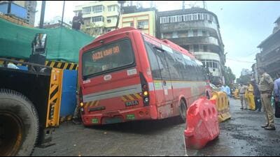 While the bus was travelling along Babasaheb Jaykar Marg, the road caved in, causing the rear left tyre to sink into the depression (Bhushan Koyande/HT Photo) While the bus was travelling along Babasaheb Jaykar Marg, the road caved in, causing the rear left tyre to sink into the depression (Bhushan Koyande/HT Photo)
