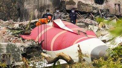Wreckage of the crashed Air India plane being lifted through a crane, in Ahmedabad. (PTI photo) Wreckage of the crashed Air India plane being lifted through a crane, in Ahmedabad. (PTI photo)