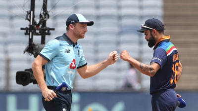 Jos Buttler, left, and Virat Kohli (AFP) Jos Buttler, left, and Virat Kohli (AFP)