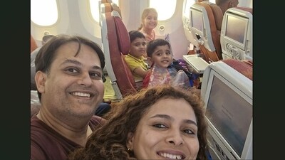 While on the plane, Pratik Joshi took a selfie of the family in which all five of them are seen smiling. (X/@volcaholic1) While on the plane, Pratik Joshi took a selfie of the family in which all five of them are seen smiling. (X/@volcaholic1)