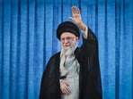 Iranian supreme leader Ayatollah Ali Khamenei waving during a ceremony on the occasion of the 36th death anniversary of Ayatollah Ruhollah Khomeini
