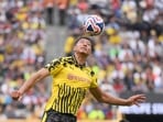 Jobe Bellingham #77 of Borussia Dortmund heads the ball during the FIFA Club World Cup 2025 group F match between Fluminense FC and Borussia Dortmund at MetLife Stadium on June 17, 2025 in East Rutherford, New Jersey. 