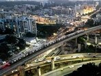 An aerial view shows the Namma Metro train of Bengaluru Metro Rail Corporation Limited (BMRCL), riding over a flyover in Bengaluru. (Pic for representation) An aerial view shows the Namma Metro train of Bengaluru Metro Rail Corporation Limited (BMRCL), riding over a flyover in Bengaluru. (Pic for representation)