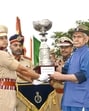 J&K LG Manoj Sinha presenting trophy during the passing out parade in Udhampur on Monday. (Source: X) J&K LG Manoj Sinha presenting trophy during the passing out parade in Udhampur on Monday. (Source: X)