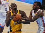 Indiana Pacers forward Pascal Siakam (43) drives as Oklahoma City Thunder guard Cason Wallace defends during the first half of Game 5 of the NBA Finals basketball series. Indiana Pacers forward Pascal Siakam (43) drives as Oklahoma City Thunder guard Cason Wallace defends during the first half of Game 5 of the NBA Finals basketball series.