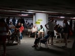 Iran-Israel War: People take shelter in a parking lot in Tel Aviv amid a fresh barrage of Iranian rockets on Tuesday.