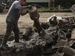 Heavy rains on Sunday tore off the outside wall of an apartment complex and damaged roads and bridges in the Marion County community of Fairmont. There were no reported injuries.