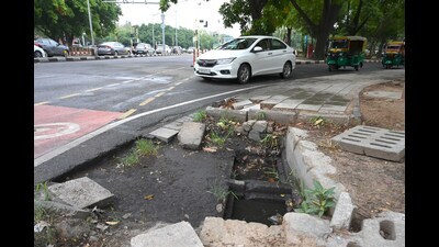 A blocked road gully at Sector 18 in Chandigarh on Tuesday following light rain. (Keshav Singh/HT) A blocked road gully at Sector 18 in Chandigarh on Tuesday following light rain. (Keshav Singh/HT)