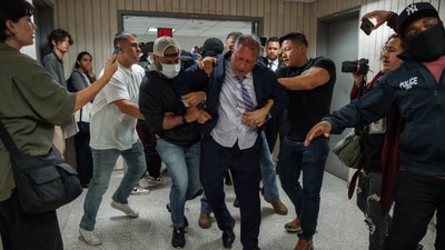 New York City Comptroller Brad Lander is placed under arrest by Immigration and Customs Enforcement (ICE) and FBI agents outside federal immigration court on Tuesday, June 17, 2025, in New York. (AP Photo/Olga Fedorova) (AP) New York City Comptroller Brad Lander is placed under arrest by Immigration and Customs Enforcement (ICE) and FBI agents outside federal immigration court on Tuesday, June 17, 2025, in New York. (AP Photo/Olga Fedorova) (AP)