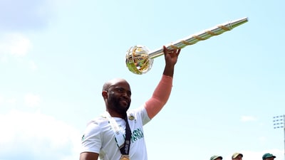 South Africa's Temba Bavuma with the ICC Test Championship Mace as the team circles the ground after winning the final (Action Images via Reuters)