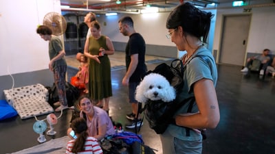 Iran-Israel War: Israelis get ready to take shelter in a parking garage in preparation for a missile attack from Iran, in Tel Aviv. (AP) Iran-Israel War: Israelis get ready to take shelter in a parking garage in preparation for a missile attack from Iran, in Tel Aviv. (AP)