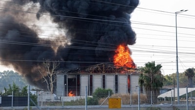 Iran-Israel War: Smoke billows from a fire in a building in Herzliya near Tel Aviv following a fresh barrage of Iranian rockets on Tuesday. (AFP) Iran-Israel War: Smoke billows from a fire in a building in Herzliya near Tel Aviv following a fresh barrage of Iranian rockets on Tuesday. (AFP)