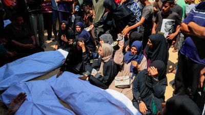 Mourners attend the funeral of Palestinians killed in what the Gaza Health Ministry said were Israeli airstrikes. (Reuters)