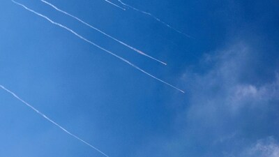 Rocket trails are seen in the sky above the Israeli coastal city of Netanya amid a fresh barrage of Iranian missiles on June 17, 2025. Israel's military said air raid sirens sounded in several areas of the country on June 17 after identifying missiles launched from Iran. (AFP) Rocket trails are seen in the sky above the Israeli coastal city of Netanya amid a fresh barrage of Iranian missiles on June 17, 2025. Israel's military said air raid sirens sounded in several areas of the country on June 17 after identifying missiles launched from Iran. (AFP)