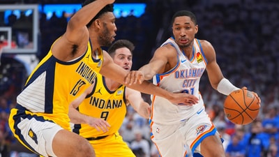 Oklahoma City Thunder guard Aaron Wiggins, right, drives as Indiana Pacers guard T.J. McConnell (9) and center Tony Bradley (13) defend during the first half of Game 5 of the NBA Finals basketball series. (AP) Oklahoma City Thunder guard Aaron Wiggins, right, drives as Indiana Pacers guard T.J. McConnell (9) and center Tony Bradley (13) defend during the first half of Game 5 of the NBA Finals basketball series. (AP)